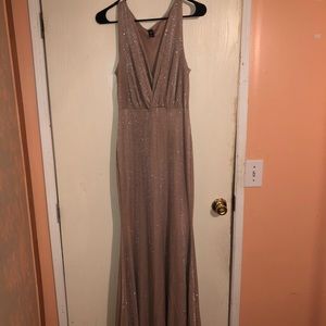 Long, trumpet style dress. Beautiful prom dress.